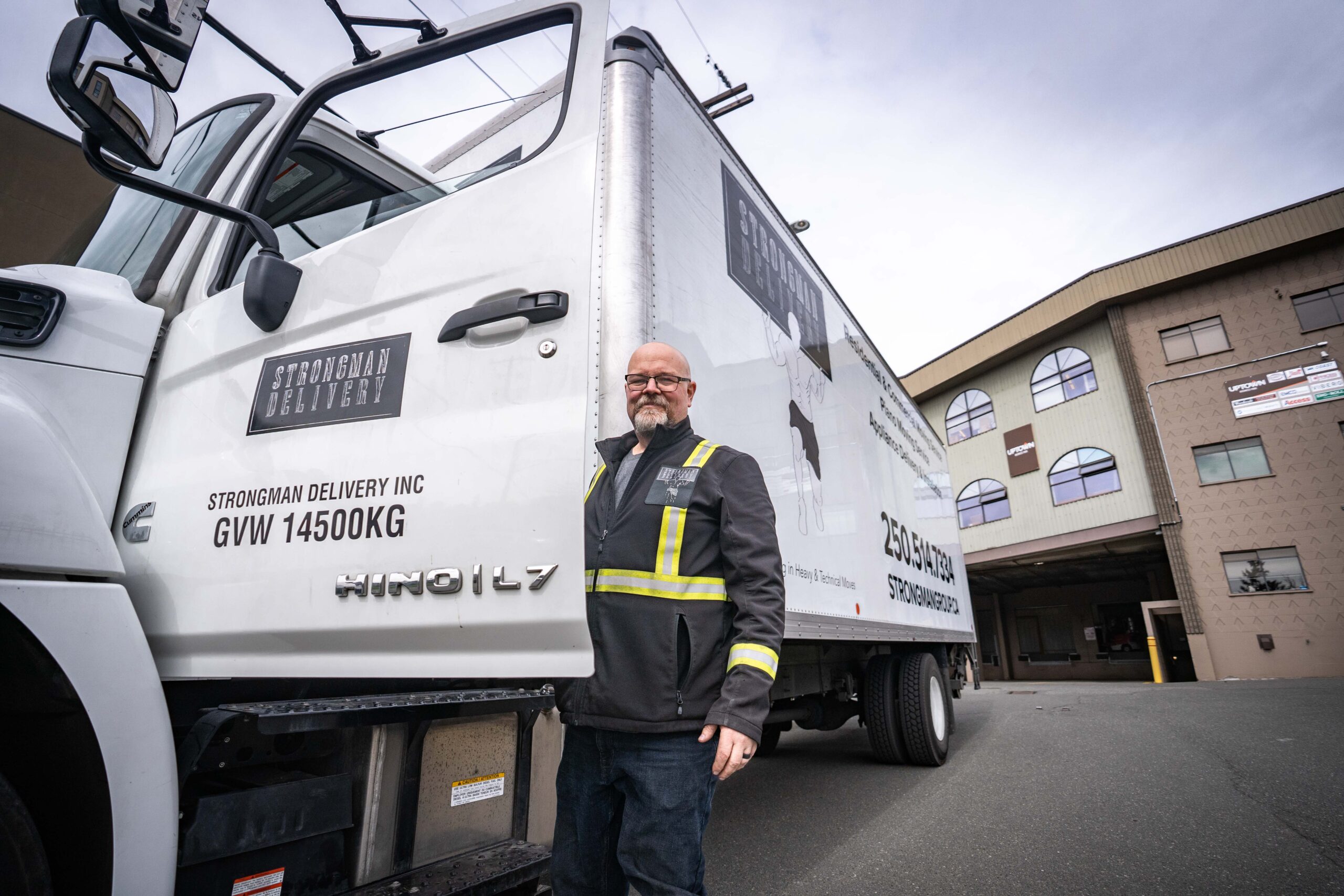 Strongman Moving crew and truck